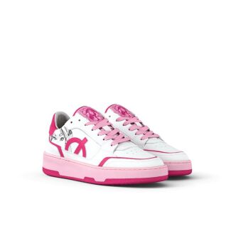 Image from the news Nicki Minaj Arrives Rocking Her New Line of Barbie Pink Vegan Sneakers