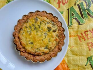 Image from the news article: Vegetable Spinach Quiche with Tofu and Herb Cream